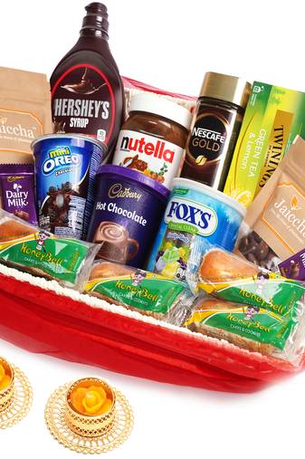 Red net basket hamper  of 21 goodies with 2 t-lites