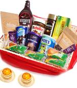 Red net basket hamper  of 21 goodies with 2 t-lites