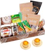 Wooden tray hamper with kaju katlis with 2 t-lites