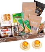 Wooden tray hamper with besan barfis with 2 t-lites