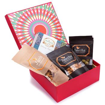 Red hamper box of assorted bites, crunchy coated cashews, crunchy coated peanuts, butter chakli sticks 1