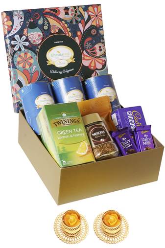 Ghasitaram big hamper box of 12 goodies with cans and 2 t-lights