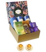 Ghasitaram big hamper box of 12 goodies with cans and 2 t-lights