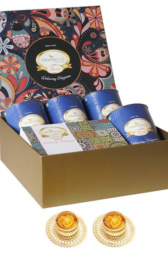 Ghasitaram big hamper box of 4 dryfruit cans and mewa bites and 2 t-lights