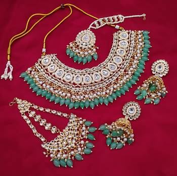 Indian gold plated kundan pearl choker bridal necklace jewellery set with earrings and mangtika. 1