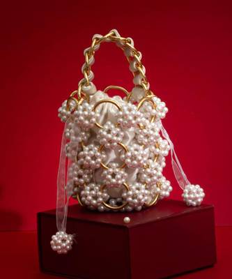 Leila pearl gold ring bucket bag 1