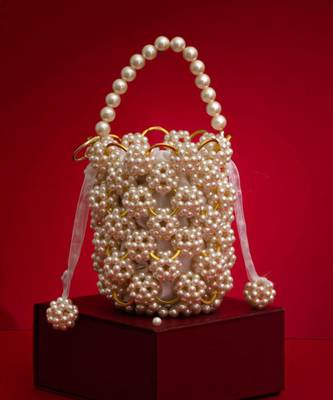 Leila off-white pearl ring bucket bag 1