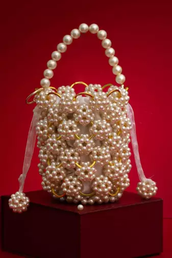 Leila off-white pearl ring bucket bag
