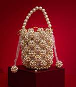 Leila off-white pearl ring bucket bag