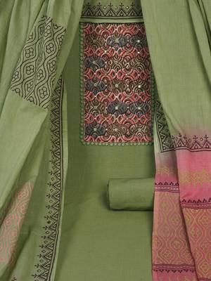 Green unstitched  suit set with kalamakri yoke paired with double dyed dupatta. 1