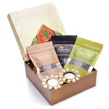 Golden hamper box of chocoate coated almonds, chocolate coated cashews, chocolate coated raisins. 1
