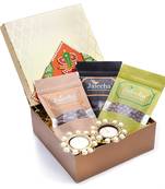 Golden hamper box of chocoate coated almonds, chocolate coated cashews, chocolate coated raisins.