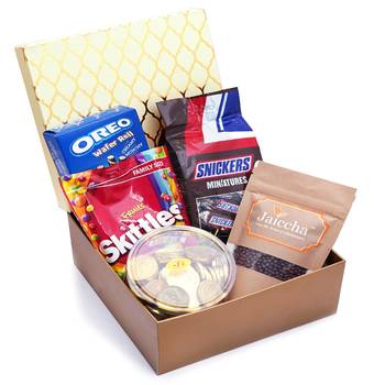 Golden hamper box of chocolate coated rice crispies pack of skittles snickers, gold coin chocolates and oreo wafers roll 1
