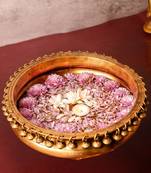 The advitya brass urli bowl with ghungroo  traditional home and festive decor piece
