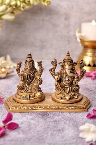 The advitya ganesh laxmi on pedestal statue murti idol set