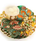 Diwali hampers-golden basket hamper of rasgulla, ,toran, rangoli and a set of 6 diyas