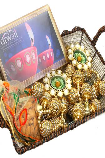 Diwali hampers-brown cane basket with happy diwali chocolate box, almonds, toran  and 2 t-lites