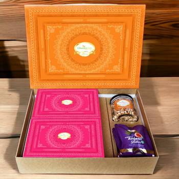 Ghasitaram orange hamper box with sugarfree kaju katli, sugarfree peda, sugarfree bites and wheat puffs 1