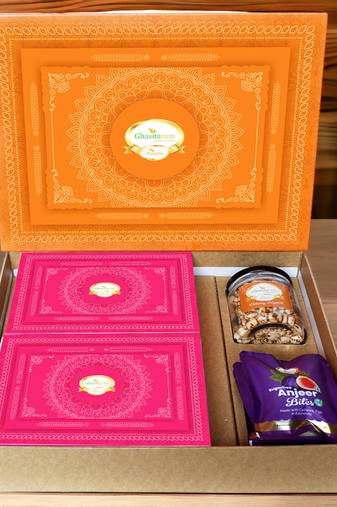 Ghasitaram orange hamper box with sugarfree kaju katli, sugarfree peda, sugarfree bites and wheat puffs