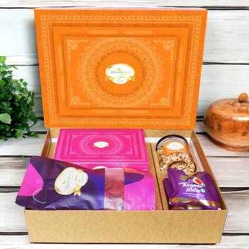 Ghasitaram orange hamper box with sugarfree kaju katli, beetroot chips, wheat puffs and sugafree bites 1