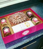 Ghasitaram big hamper tray  of kaju katlis , peri almonds, pistachios, wheat puffs and choco rice crispies