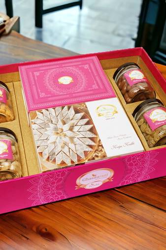 Ghasitaram big hamper tray of kaju katlis, milk cake, crunchy cashew, paan raisins, choco almonds, and pistachios