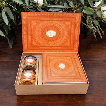 Ghasitaram orange hamper box with exotic sweets,crunchy cashew and flavour raisins jar 1