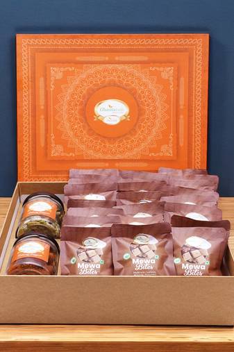 Ghasitaram orange hamper box of  24 pcs mewa bites, mixed dryfruit jar and flavour raisins jar
