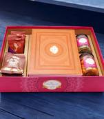 Ghasitaram big hamper tray with exotic sweets, crunchy cashew, flavour raisins, mewa bites and cookies