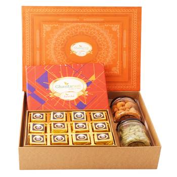 Orange hamper box of mewa bites,crunchy cashew and flavour raisins jars 1