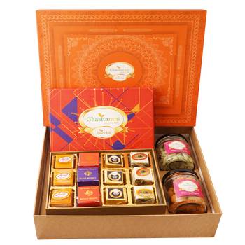 Orange hamper box with best bites,crunchy cashew and flavour raisins jars 1