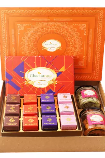 Orange hamper box with sugarfree mewa bites bites,crunchy cashew and flavour raisins jar