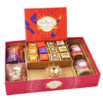 Big hamper tray with best bites, diya, and crunchy cashew, flavour raisins, mewa bites and cookies 1
