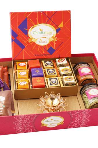 Big hamper tray with best bites, diya, and crunchy cashew, flavour raisins, mewa bites and cookies