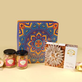 Diwali hamper box of kaju katli, 2 jars of dryfruits and diya 1