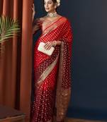 Red zari butti work pure georgette traditional saree with blouse