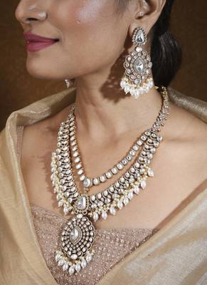 Bridal necklace set with earrings and maang tikka in american diamond stones 1