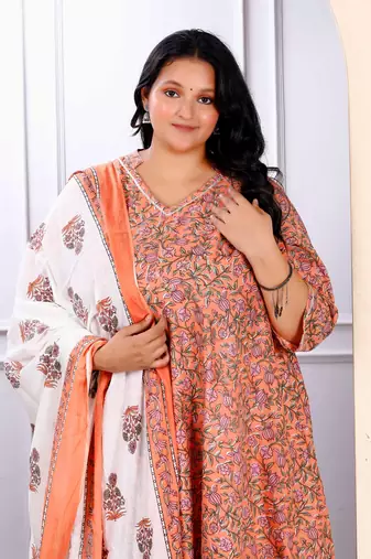 Womens plus size surpassing orange colored partywear floral printed cotton kurta dupatta set
