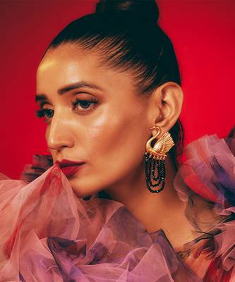 Gold swan earrings 1