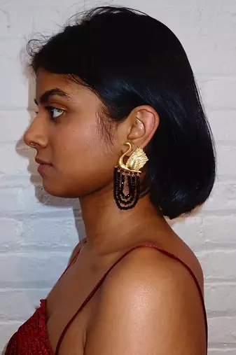 Gold swan earrings