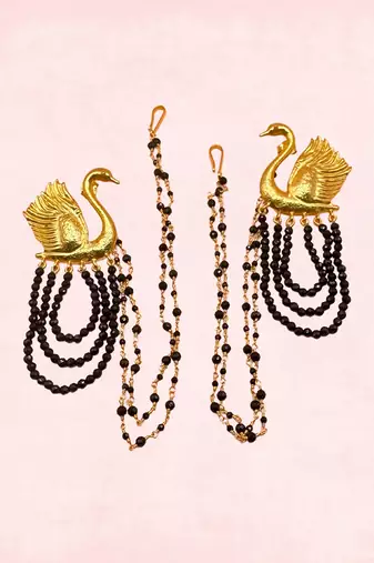 Gold swan earrings repeat