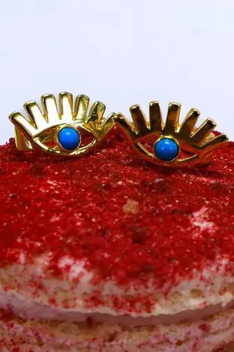 Gold evil eye ear cuffs