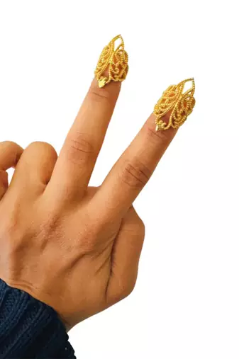Gold niya nail ring