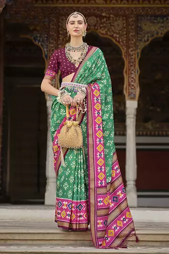 Light green and pink patola print silk festival saree