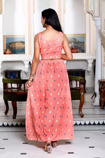Womens peach animal print round neck top with side slit skirt co-ord set