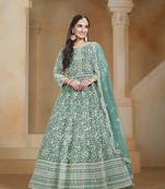 Net turquoise embroidered salwar kameez