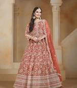 Net rust embroidered salwar kameez