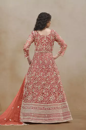 Net rust embroidered salwar kameez
