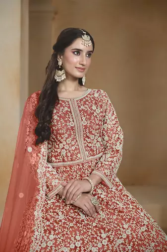 Net rust embroidered salwar kameez