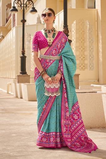 Patola silk Blend turquoise and rani pink patola print classic saree